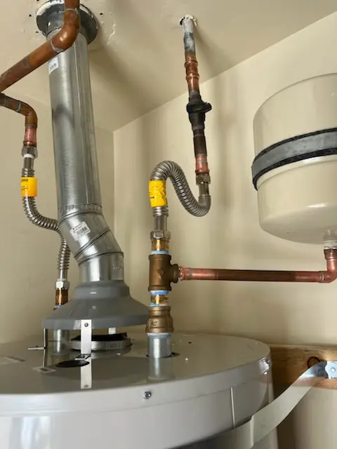 Water heater installation and plumbing repair in Mulino